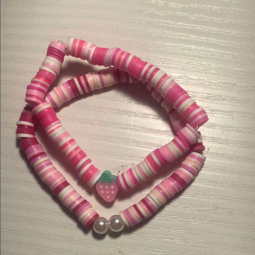 Pink and White Beaded Bracelet with Strawberry Charm